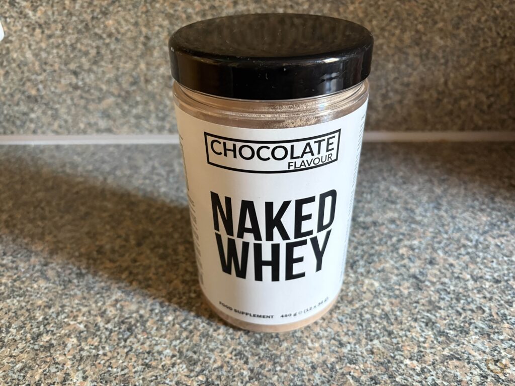 Naked Nutrition Chocolate Flavour 450g Whey Dose seitlich